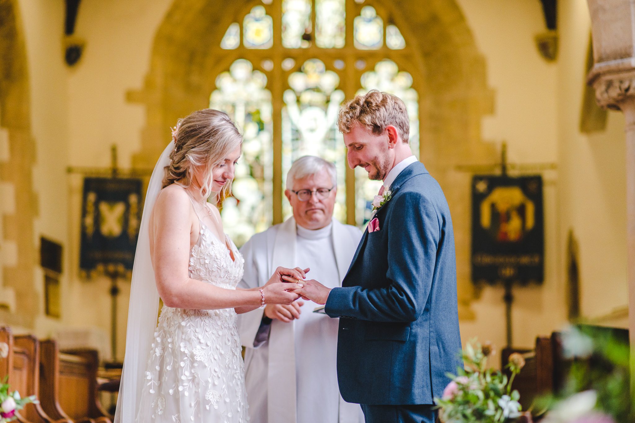 A couple getting married at Chedworth Church