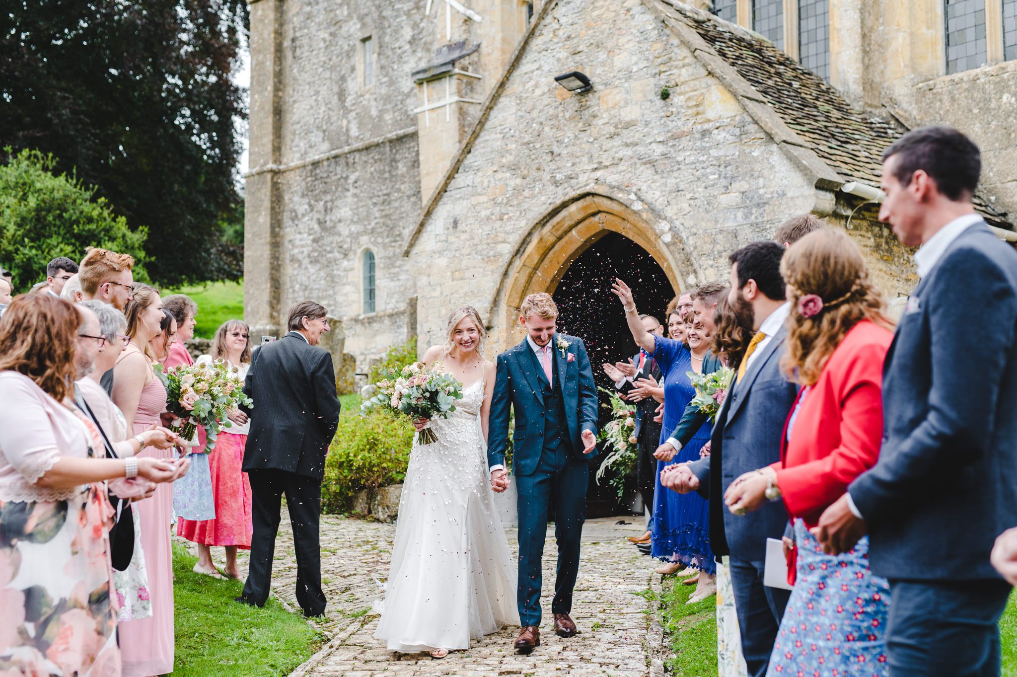 After the ceremony candid photography at Chedworth church