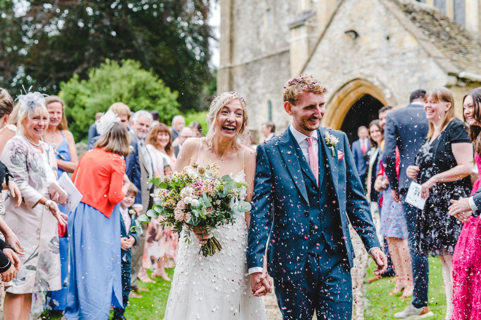After the ceremony confetti at Chedworth church