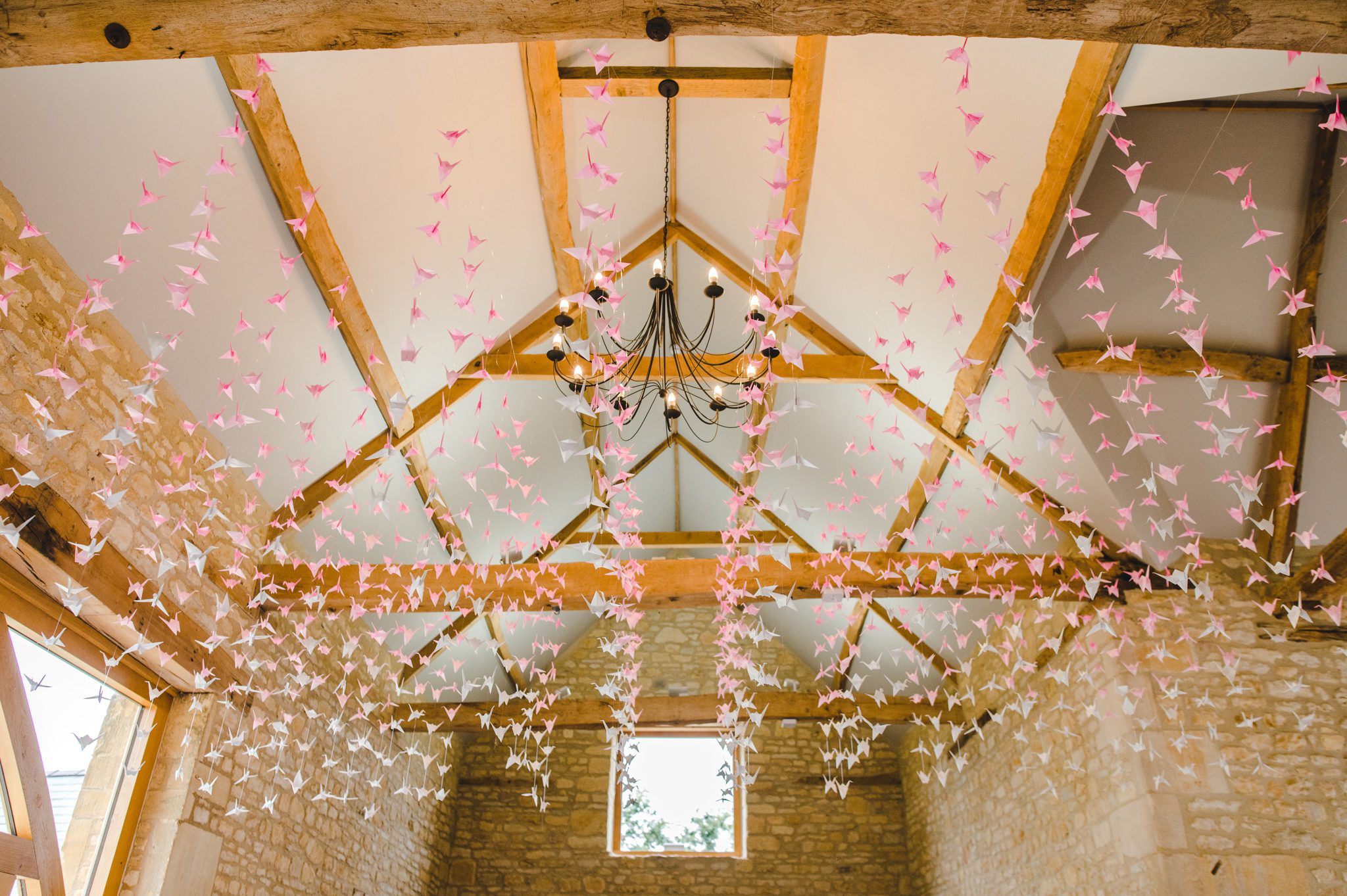Cranes hanging from the ceiling at Upcote Barn