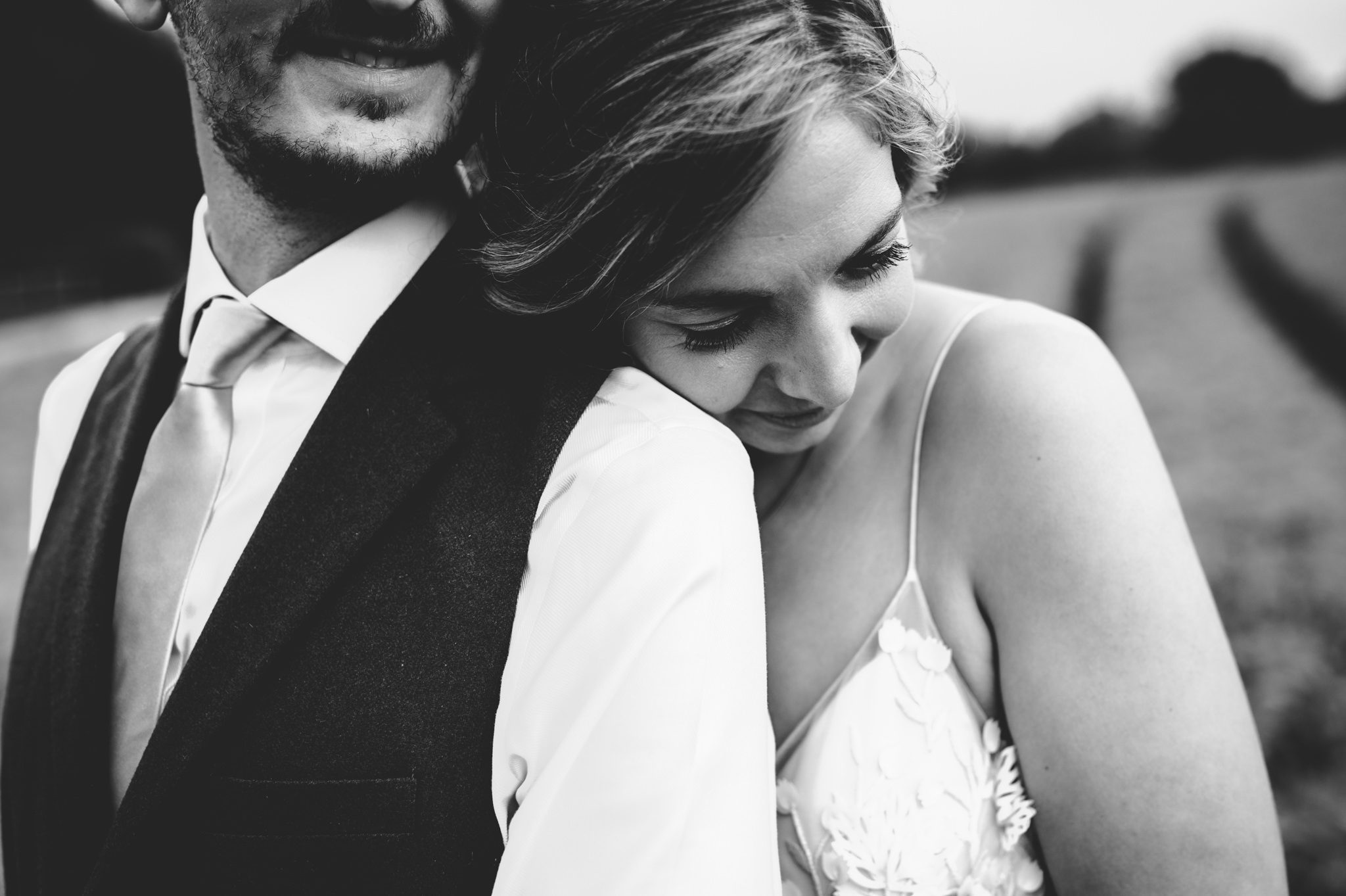 A close up of a bride & groom at Upcote Barn