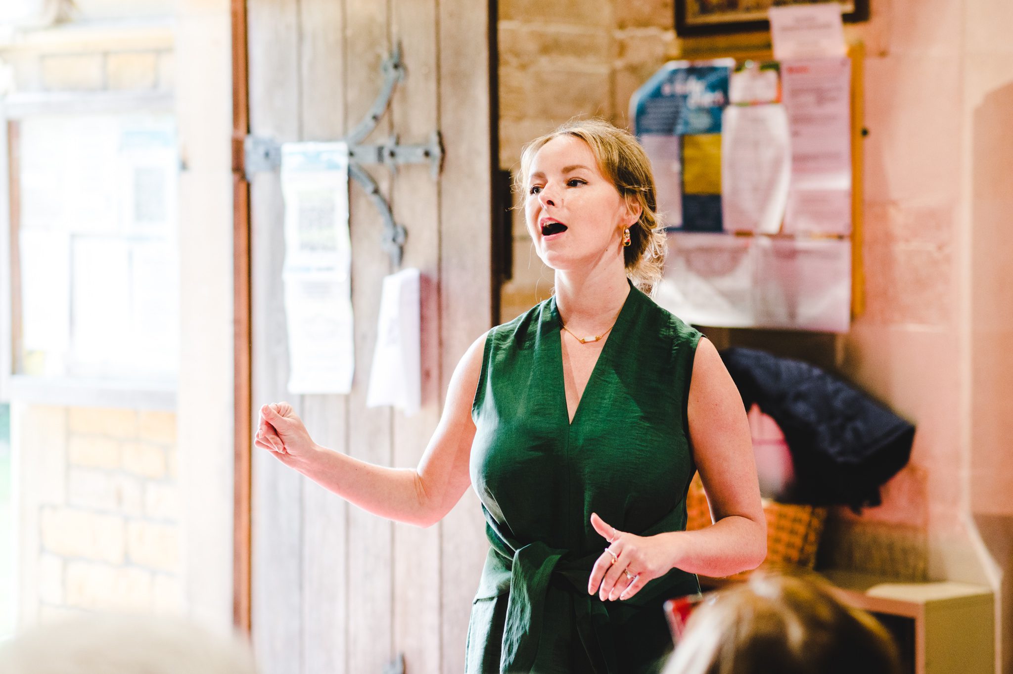 A singer singing a song in a church at a wedding