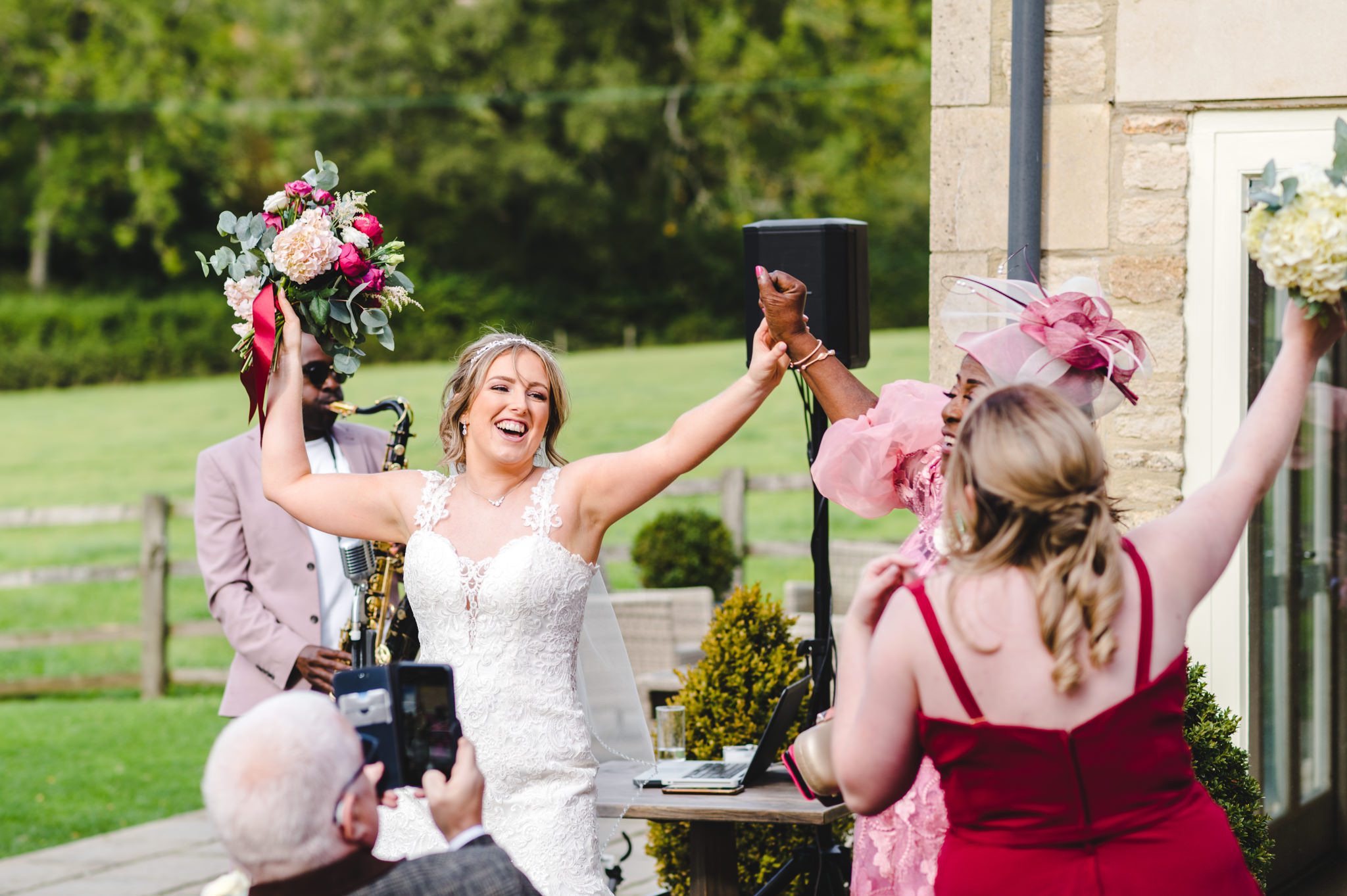 A bride dancing during her wedding reception at Hyde House