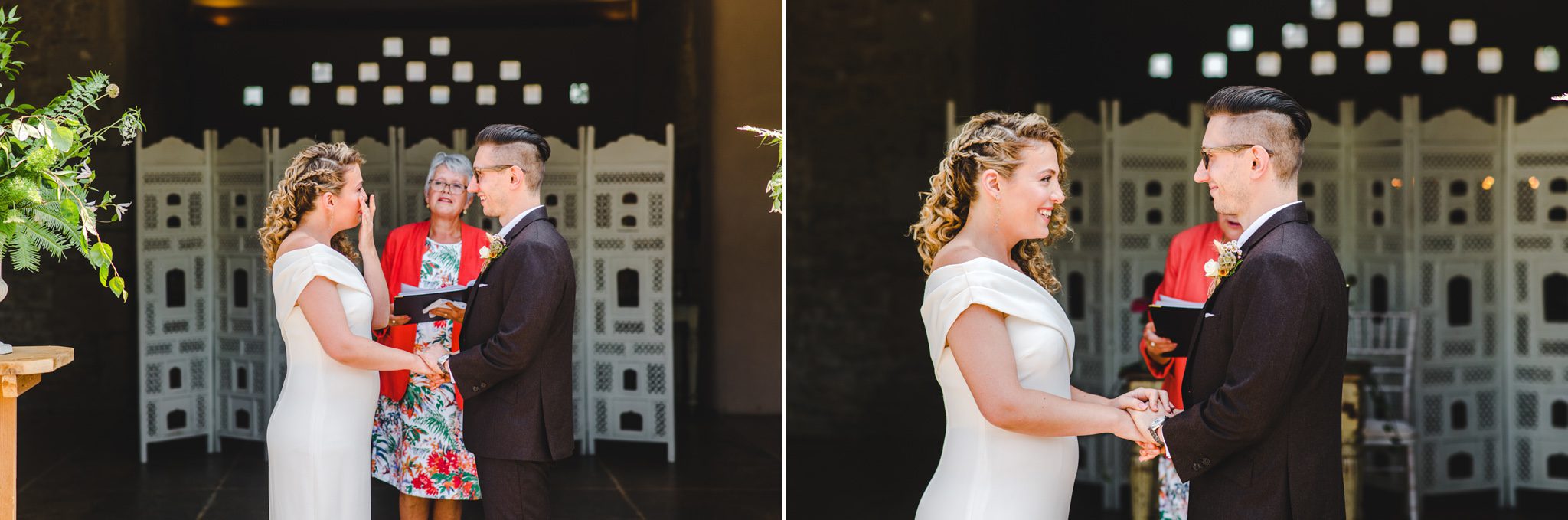 A bride crying and a groom smiling on their wedding day at Oxleaze