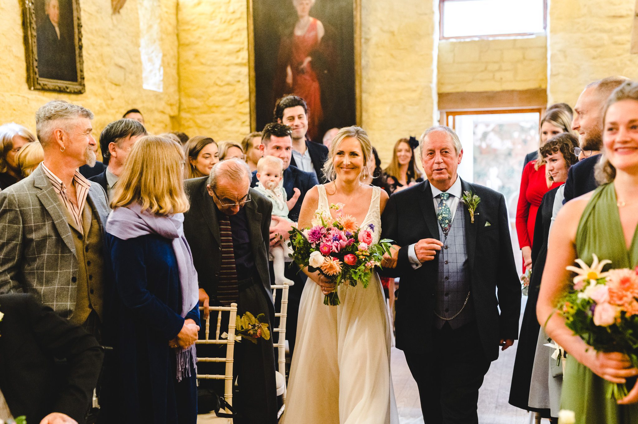 Wedding ceremony at Owlpen Manor by Bigeye Photography in the Cider Barn