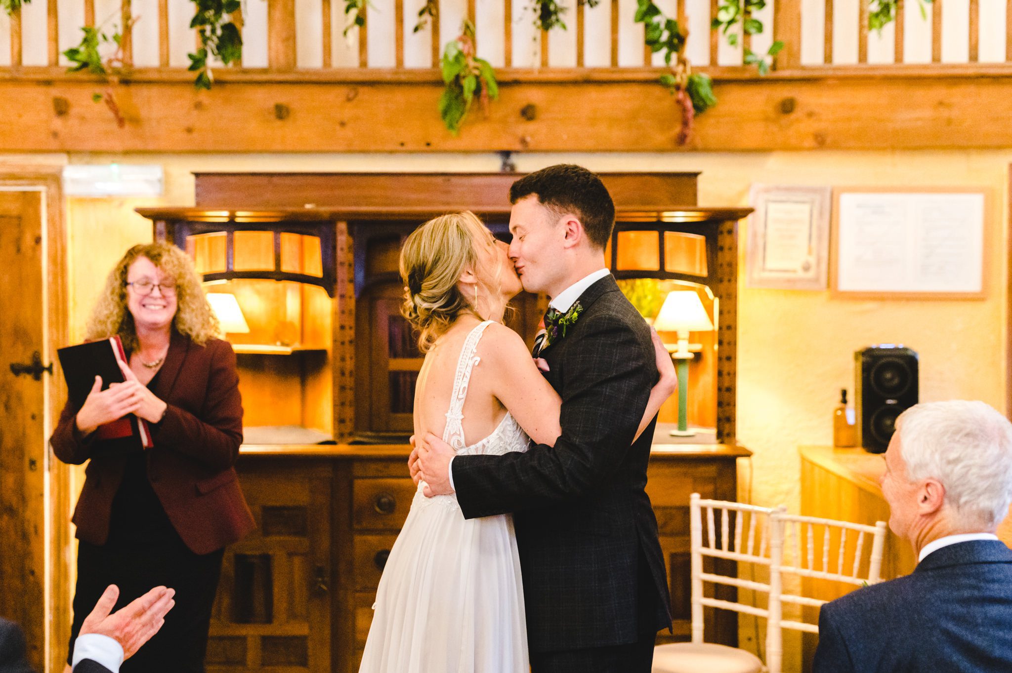 Wedding ceremony at Owlpen Manor by Bigeye Photography in the Cider Barn