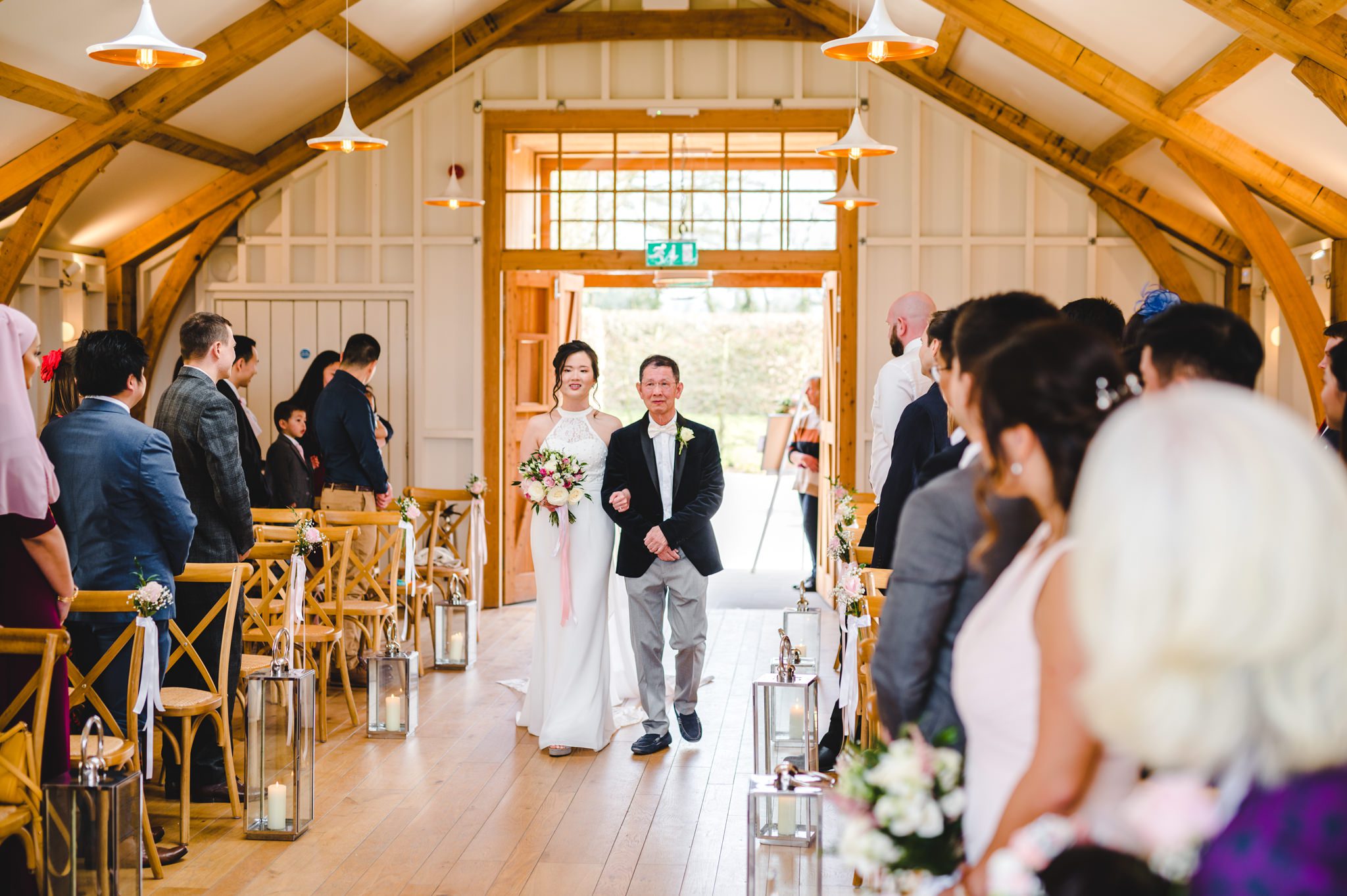 Brdie walking gdown the aisle at Hyde House