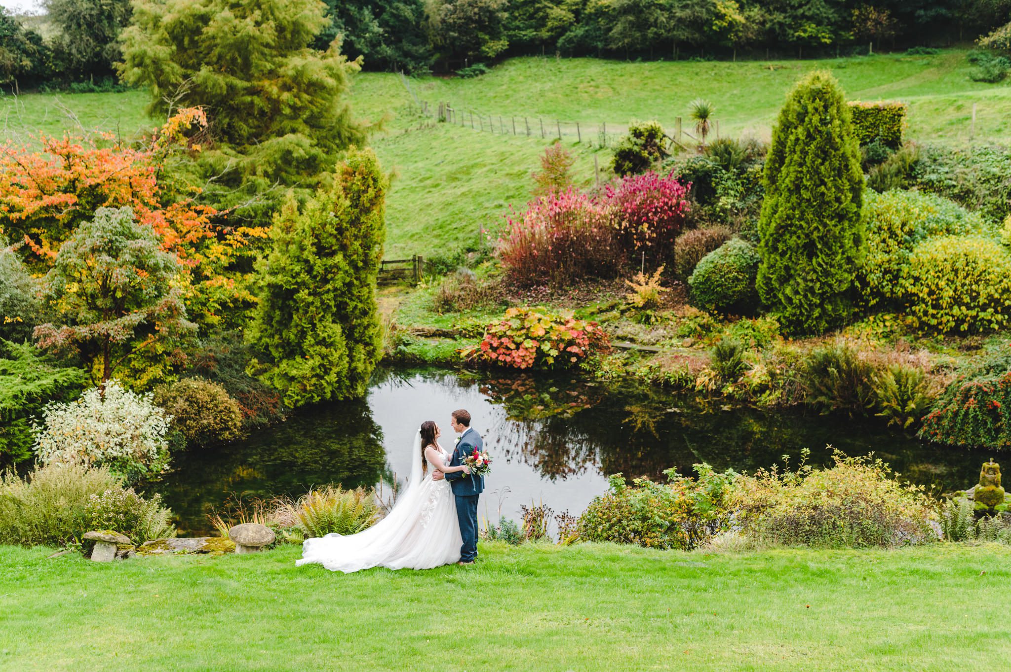 photography by the lake in the secret garden at The Barn at Upcote