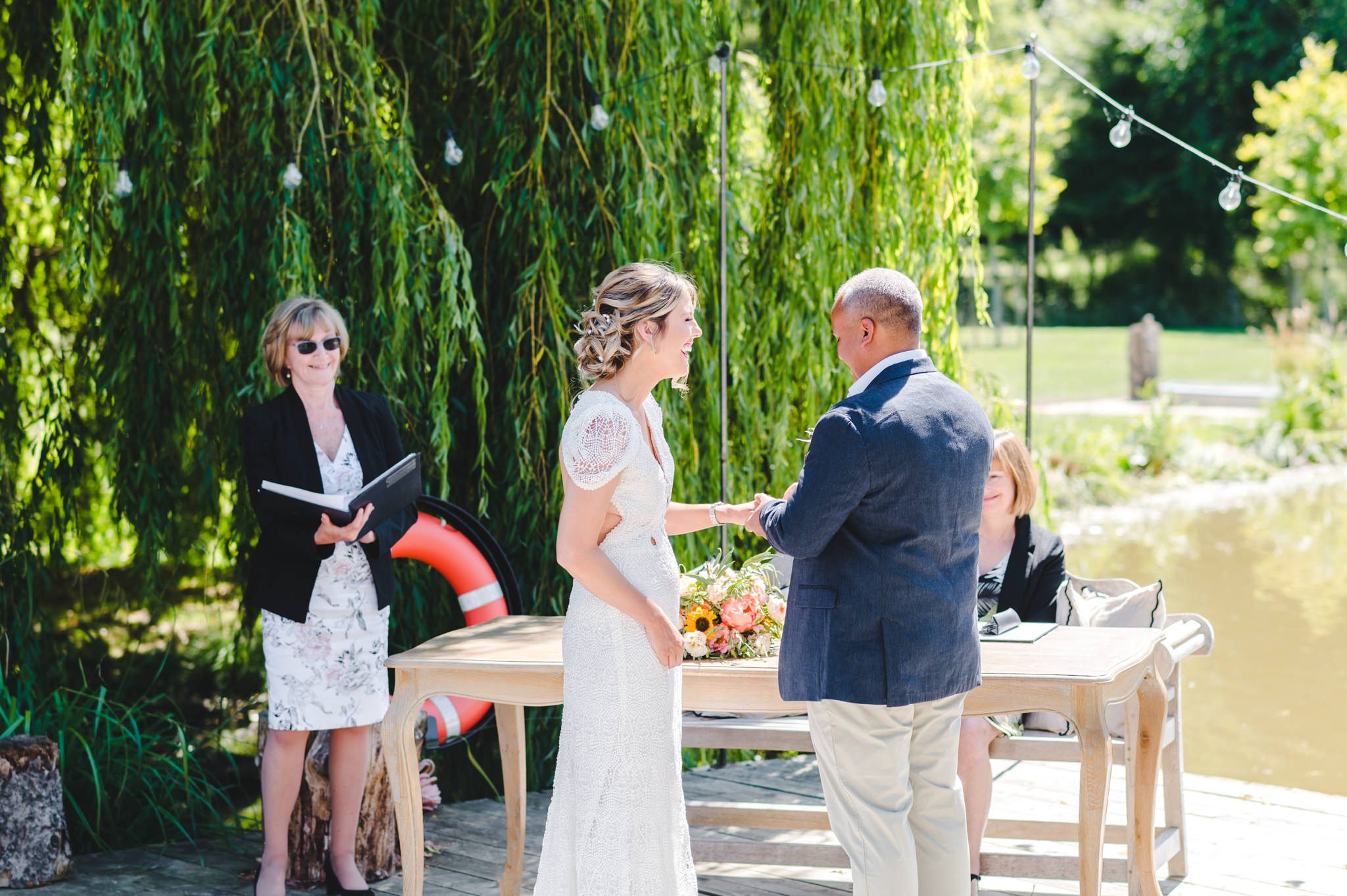 Ring exchange at a Barns and Yard wedding ceremony