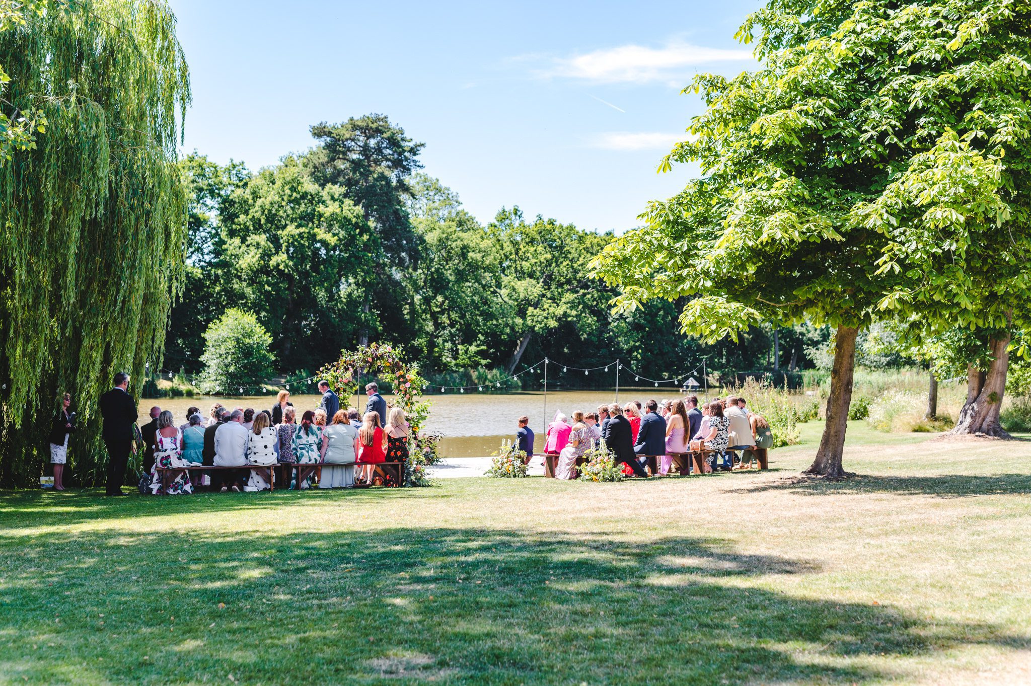 Wide view of an outdoor ceremony at Barns and Yard wedding venue in Worcestershire