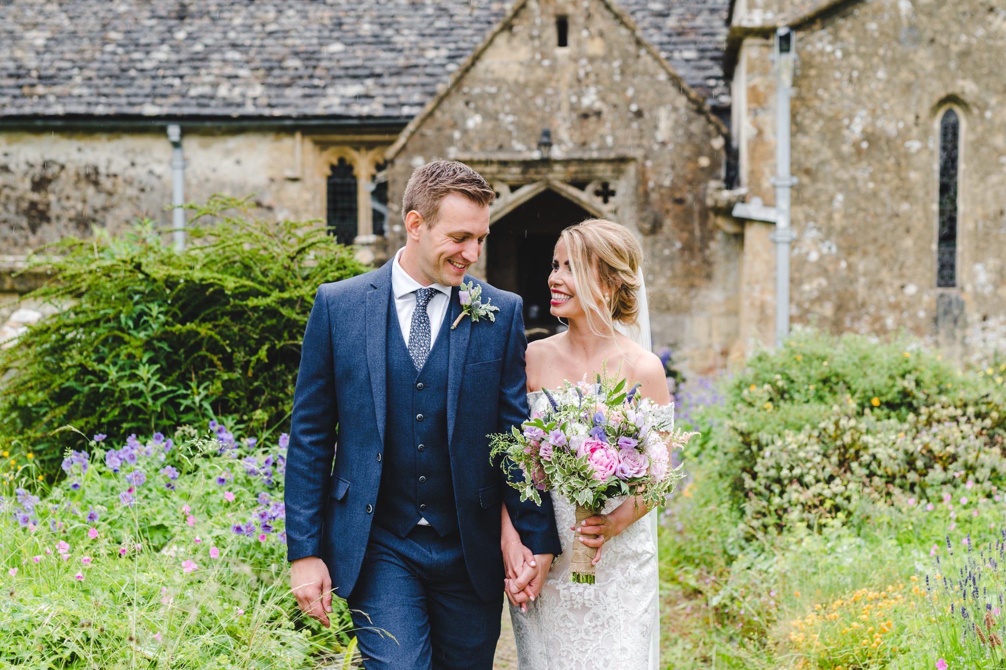 A bride and groom looking into each others' eyes