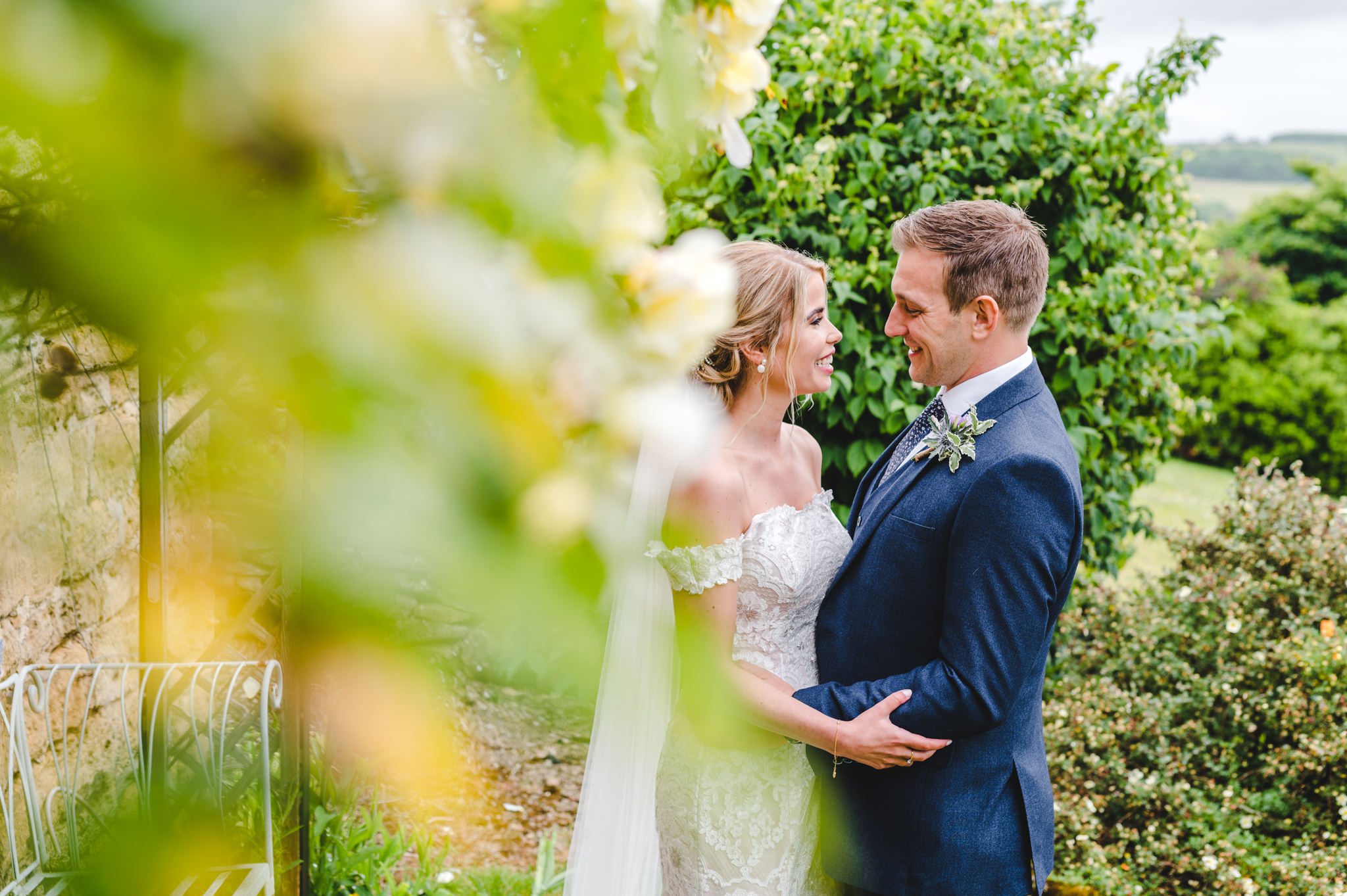 Pictures in the secret garden at Upcote Barn with the Bride and Groom by Bigeye Photography