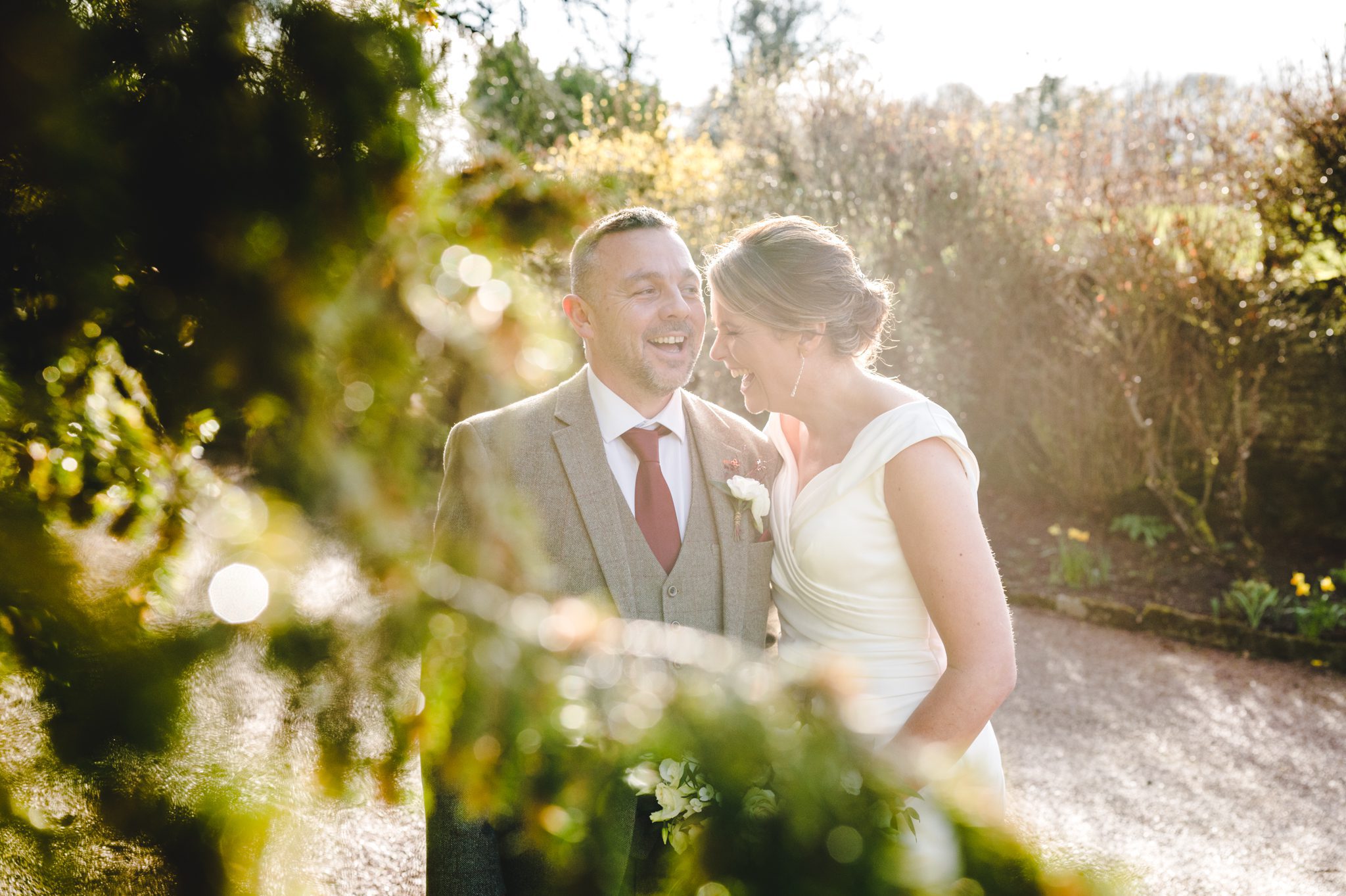 Clearwell Castle Wedding Photography showing a couple at sunset