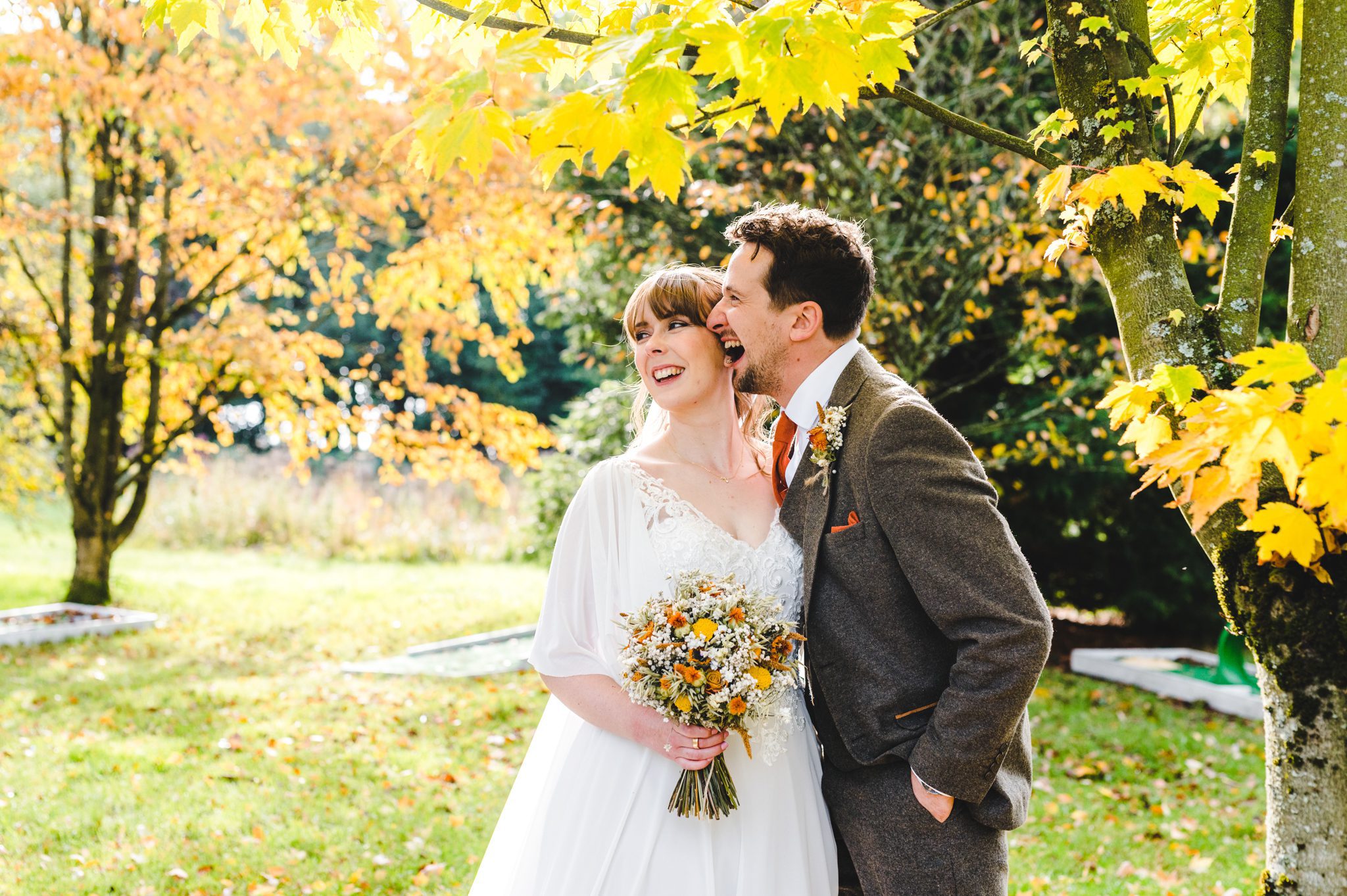 A couple having their wedding photographs taken at a Matara Centre wedding in the Cotswolds