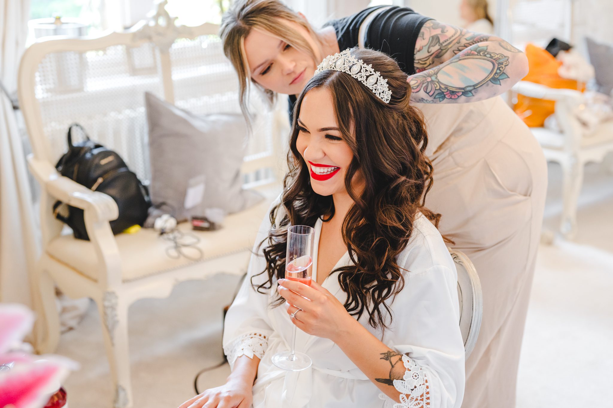 A bride having her hair styled