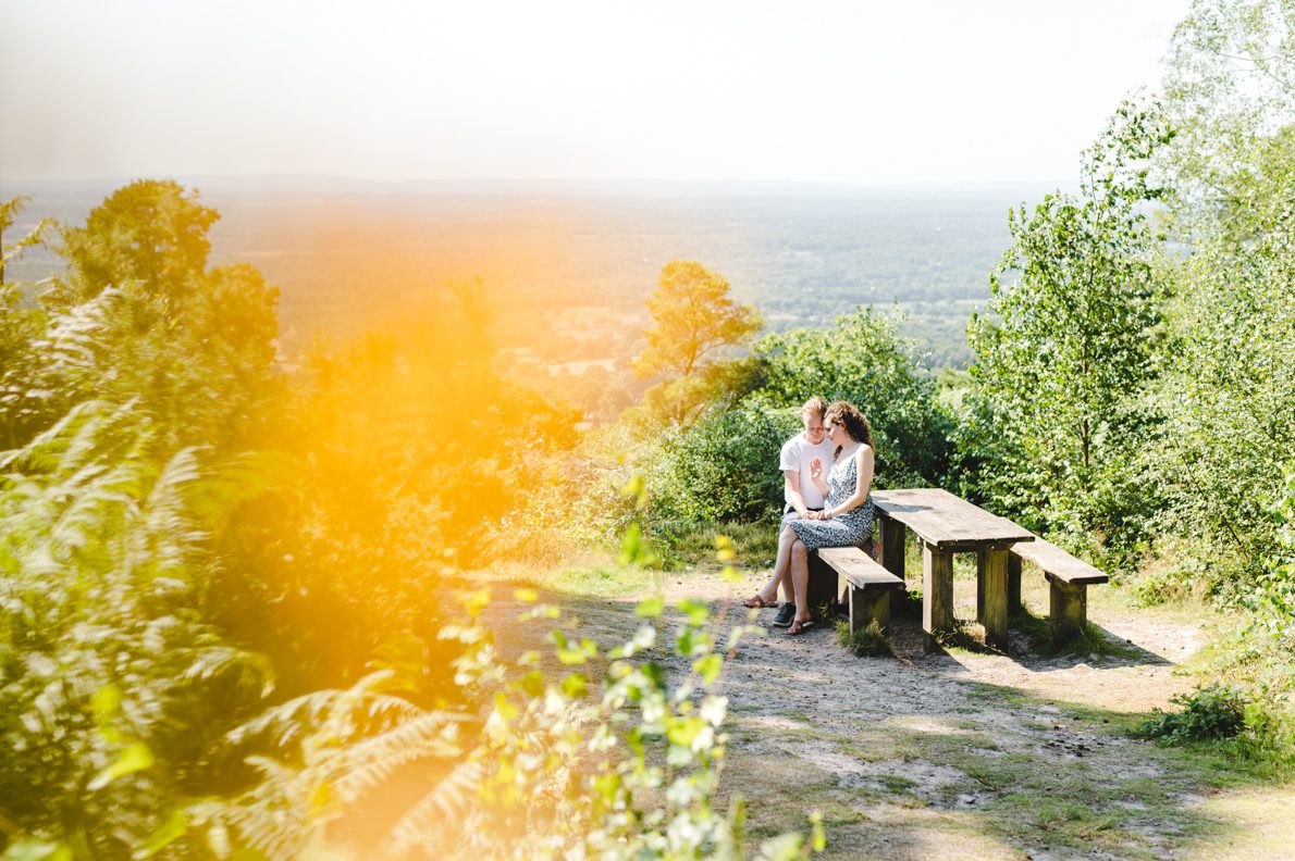 A couple engaged on Leith Hill near London