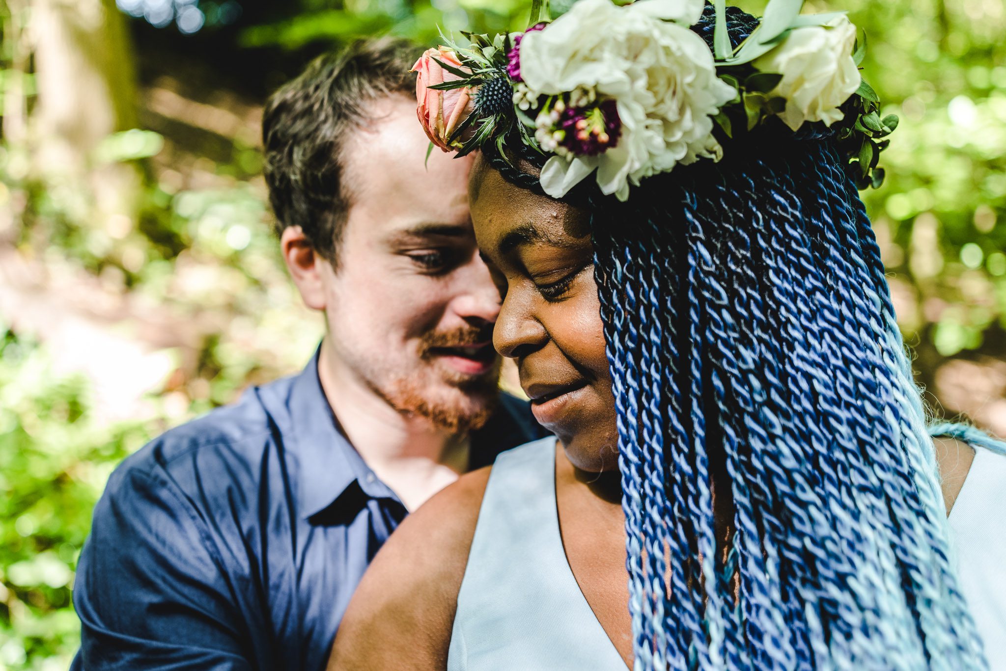 A couple, one with a cultural headdress