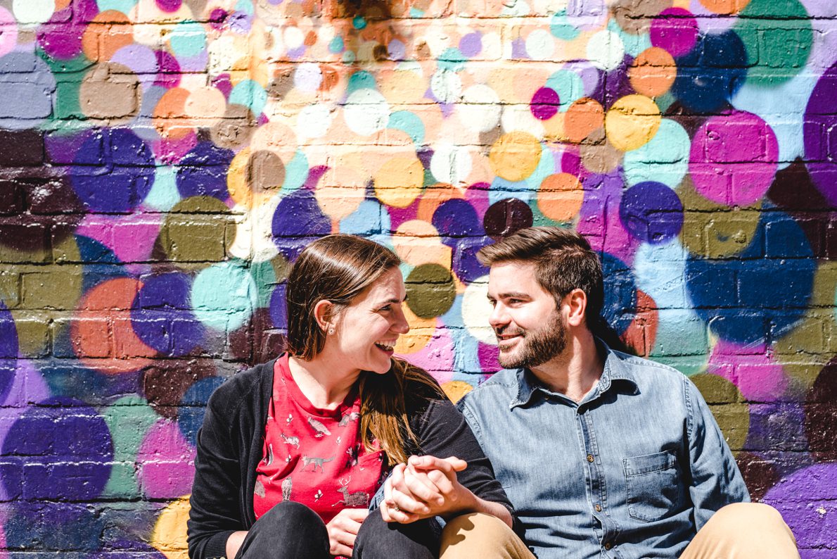 engagement photography with a bright colourful background