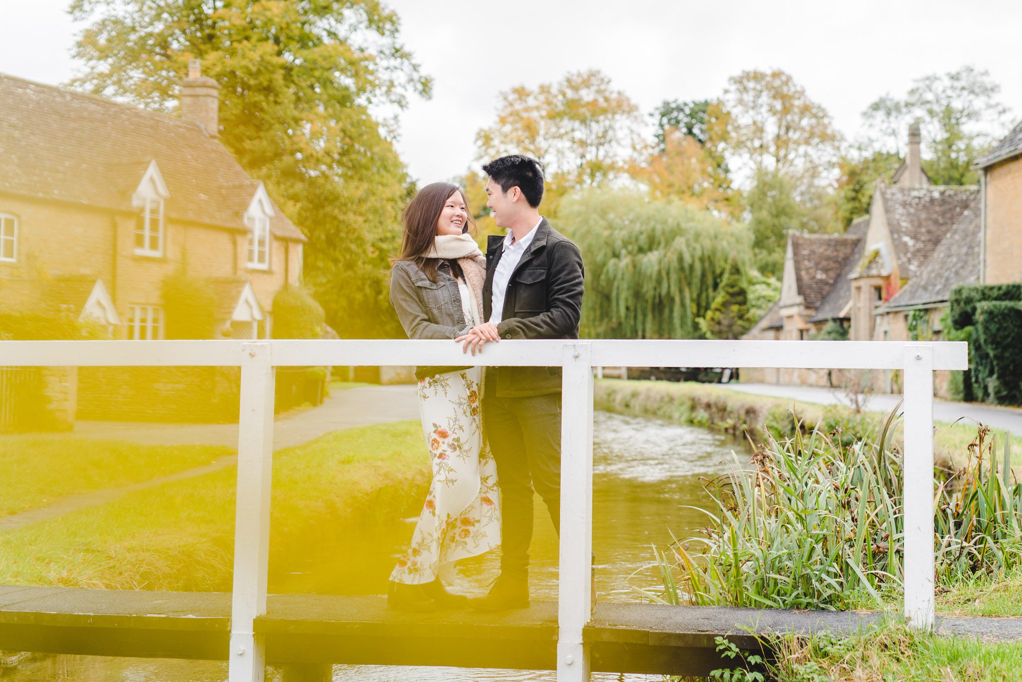 A Chinese couple on a bridge