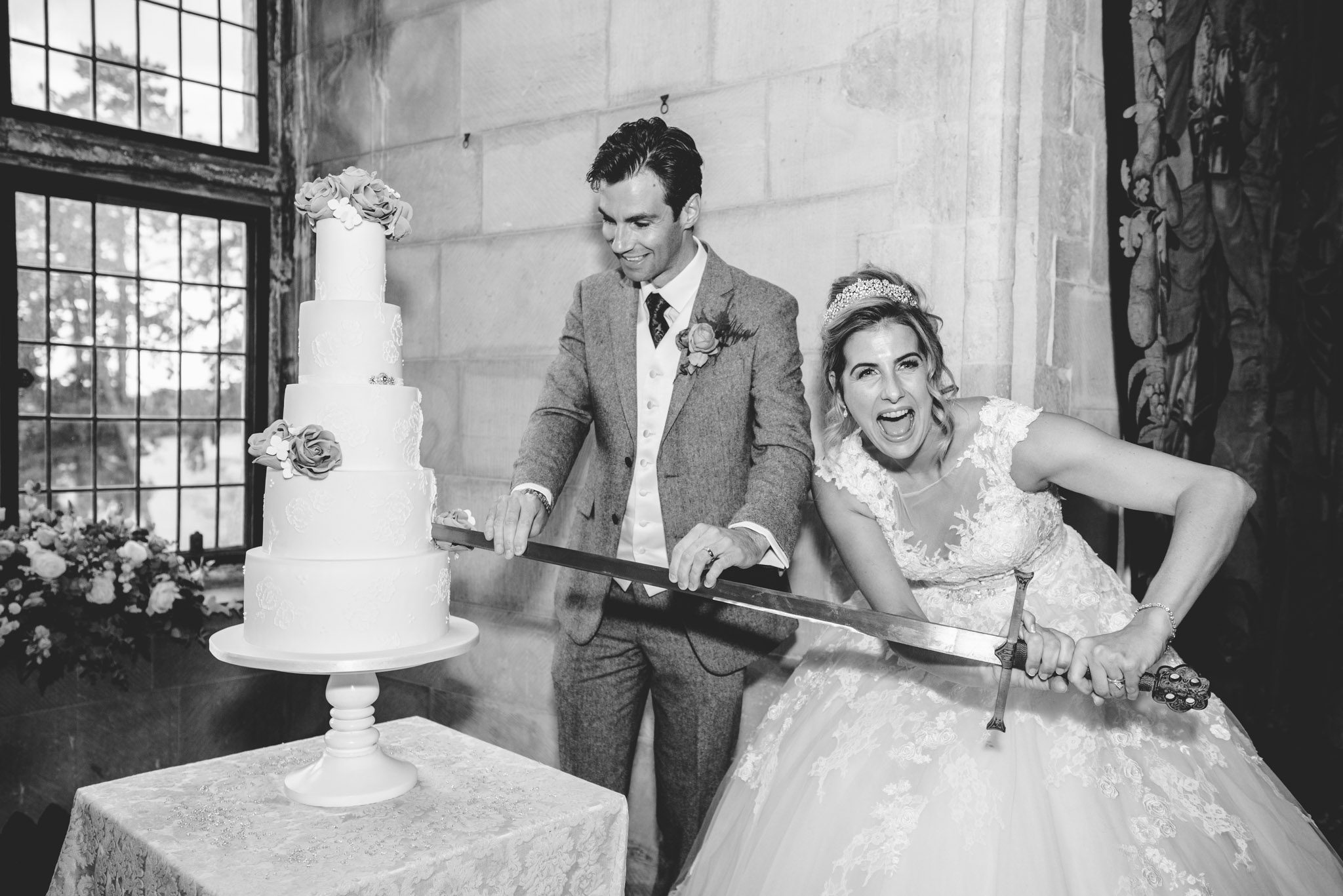Berkeley Castle wedding cake cut