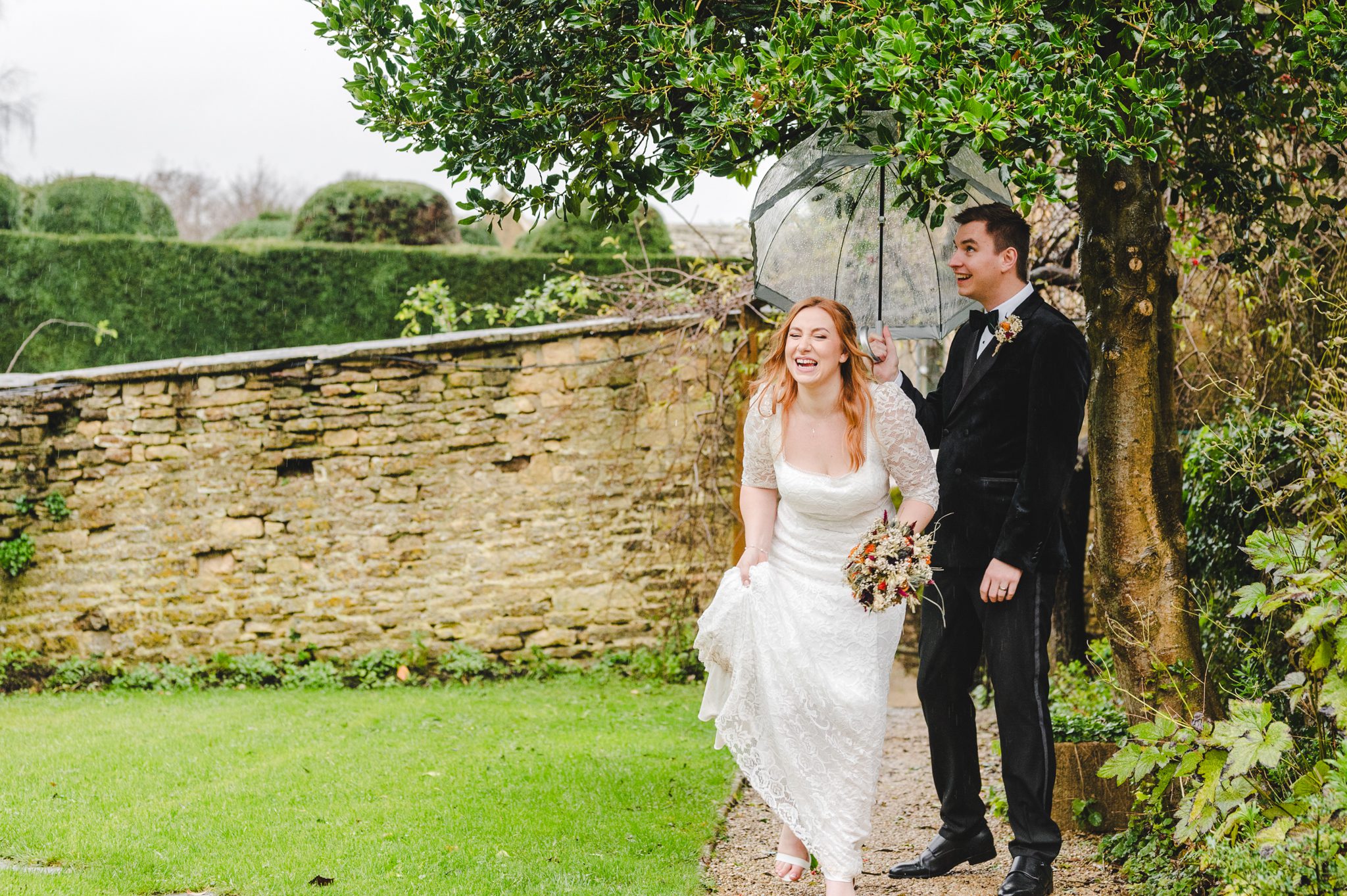 a couple celebrating their wedding day at owlpen manor